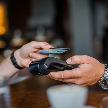 Card being swiped during financing for auto repairs